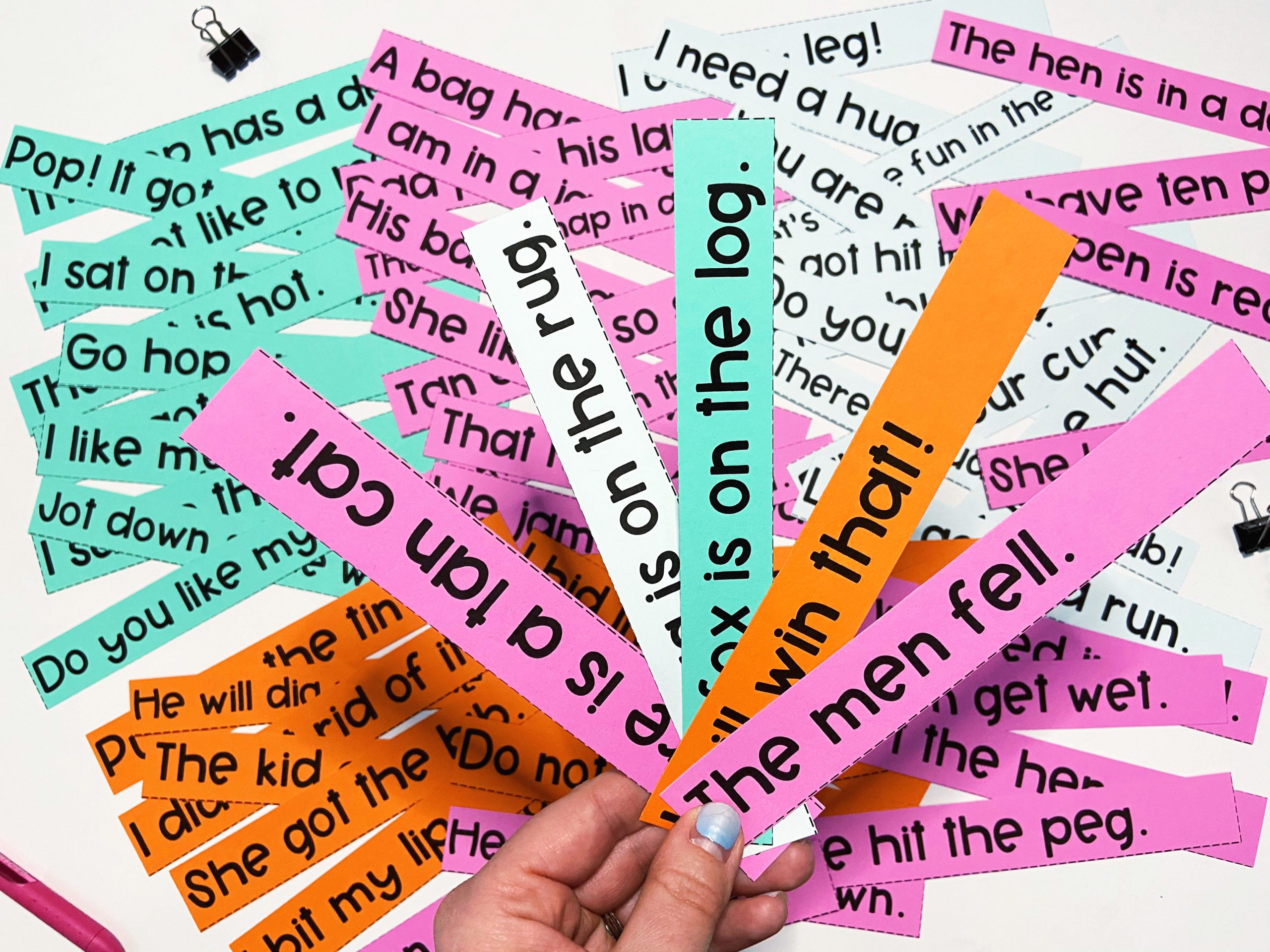 short vowel fluency strips 5 different short vowel sentences on different colored strips